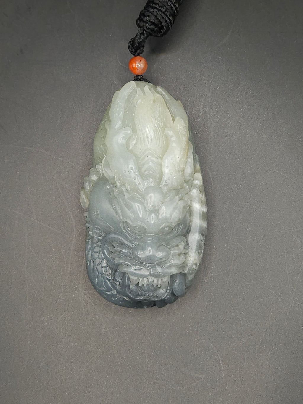 Nephrite river jade black and white dragon pendant