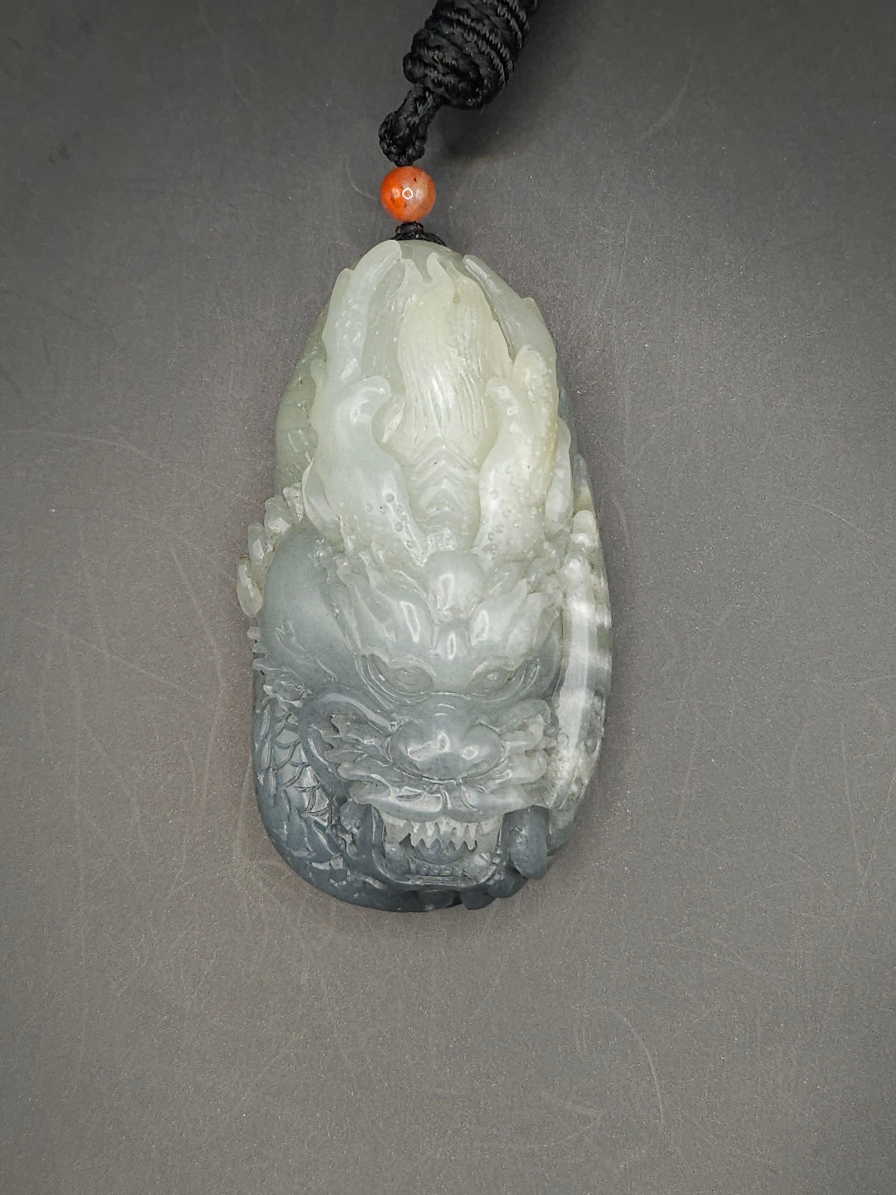 Xinjiang nephrite river jade black and white dragon pendant