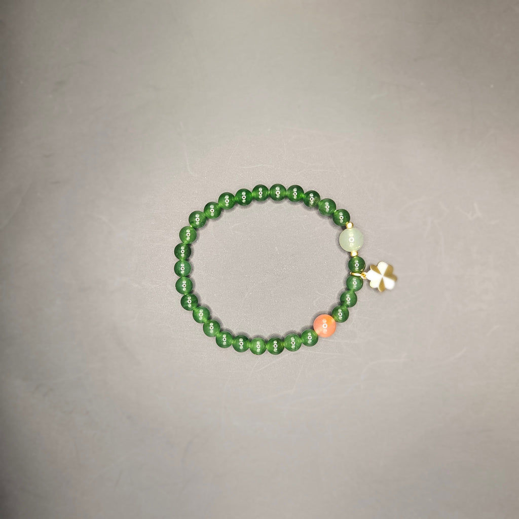 Siberian jasper Bracelet (Adorned with one Nanhong Agate bead and one pale "Clear Water" jade bead)