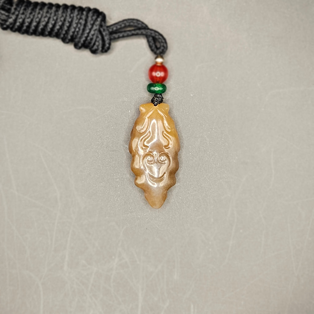 Red Sugar nephrite Jade Carved Pendant — "Ghost Face"
