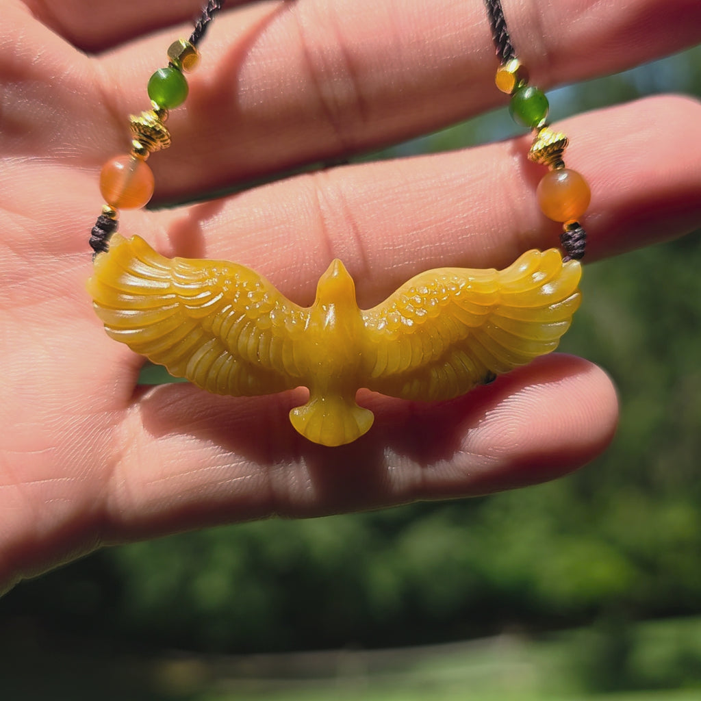 Nephrite jade pendant carved with a flying eagle