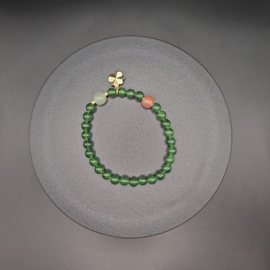 Siberian jasper Bracelet (Adorned with one Nanhong Agate bead and one pale "Clear Water" jade bead)