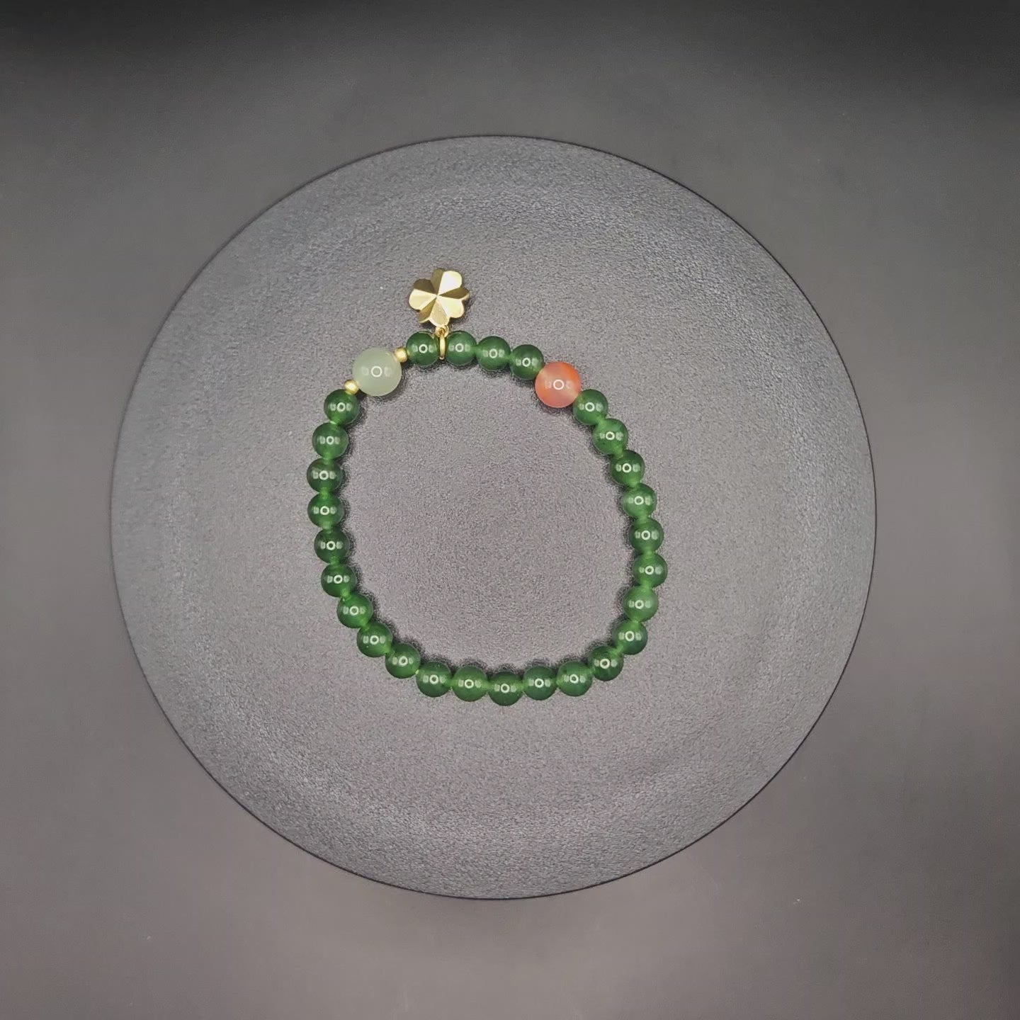 Siberian jasper Bracelet (Adorned with one Nanhong Agate bead and one pale "Clear Water" jade bead)