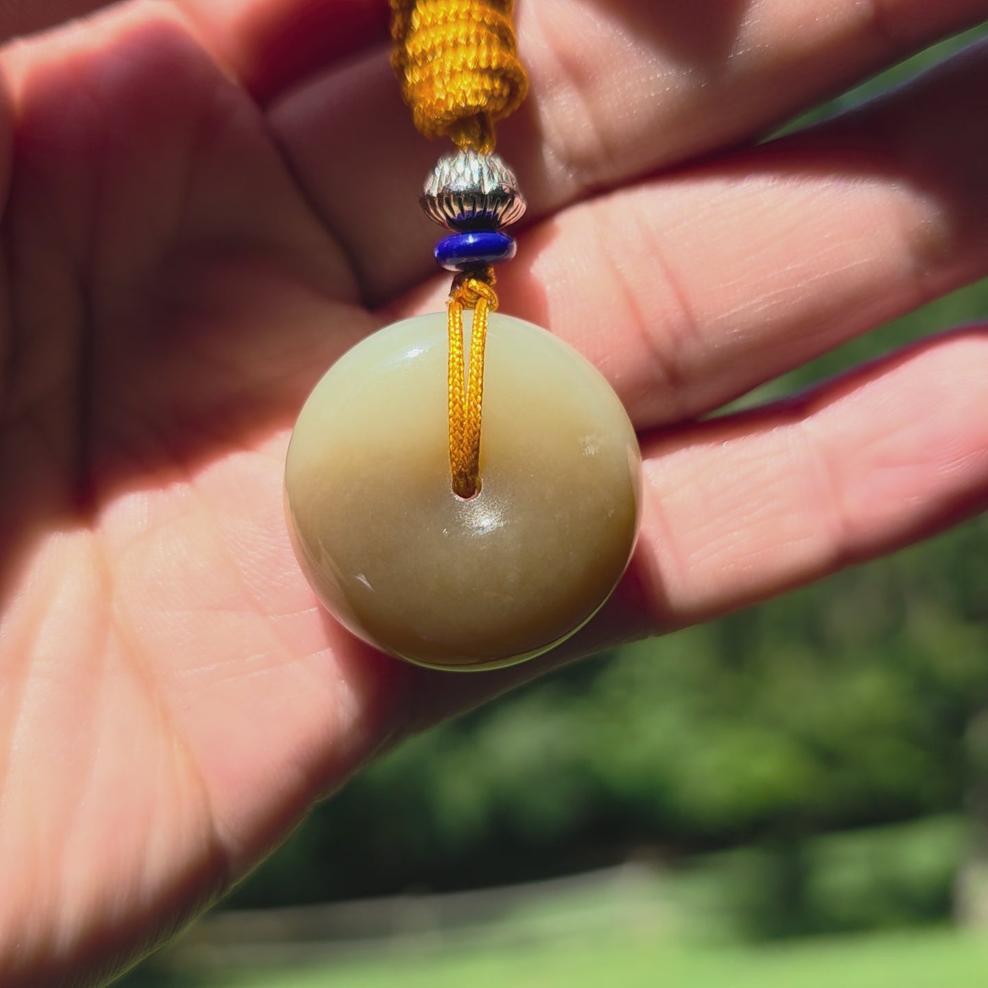 White and Caramel-Colored Nephrite Jade "Peace Buckle" Pendant