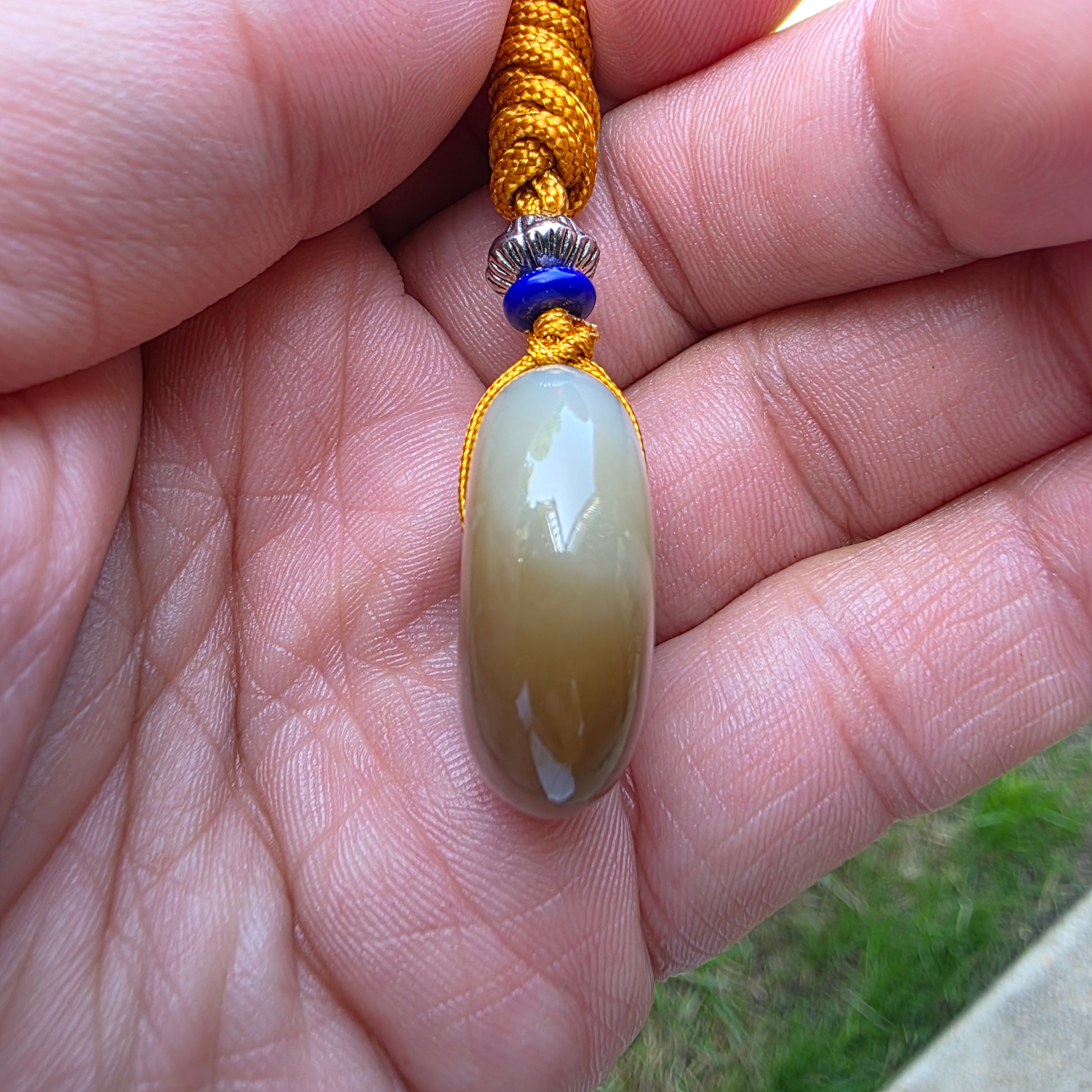 White and Caramel-Colored Nephrite Jade "Peace Buckle" Pendant