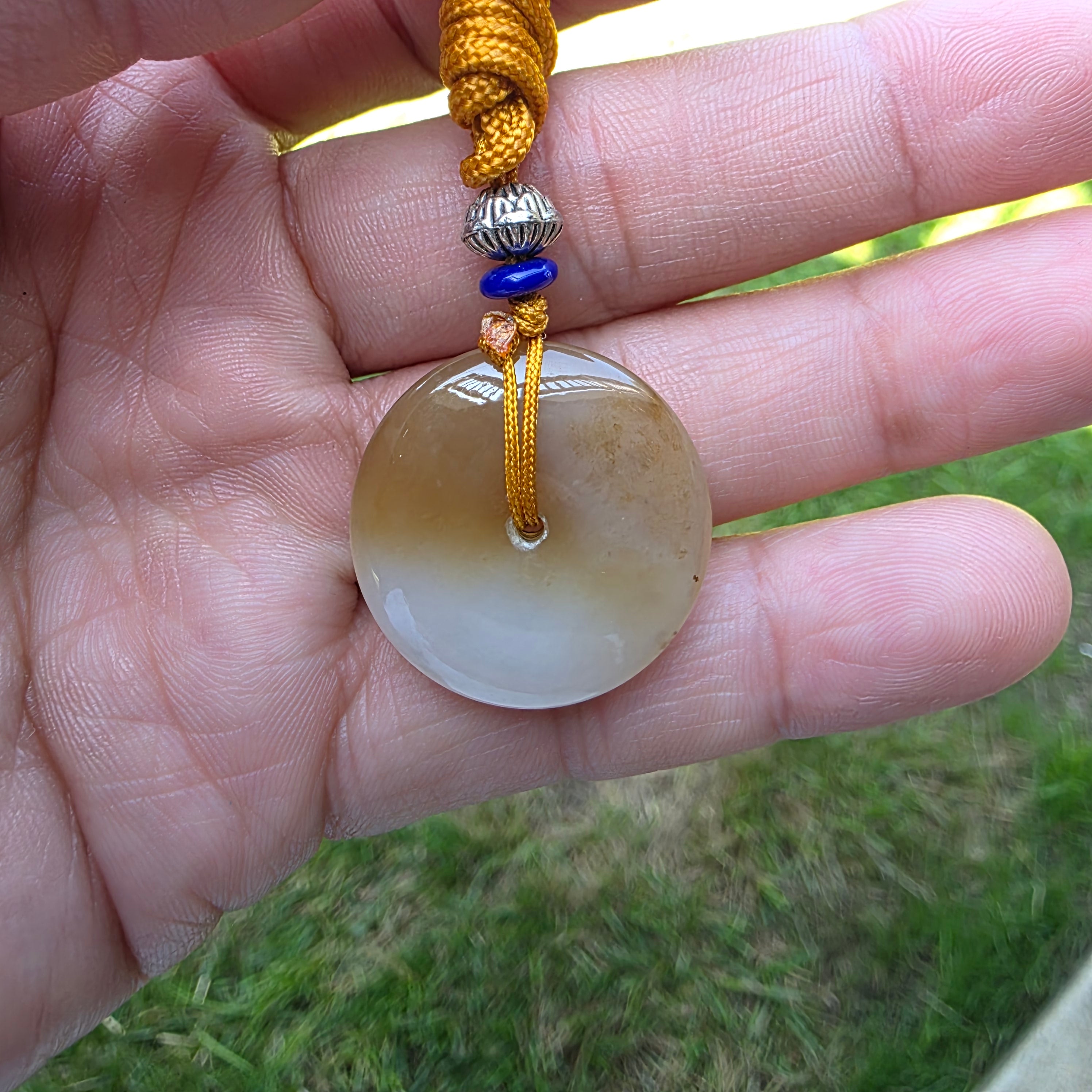 White and Caramel-Colored Nephrite Jade "Peace Buckle" Pendant