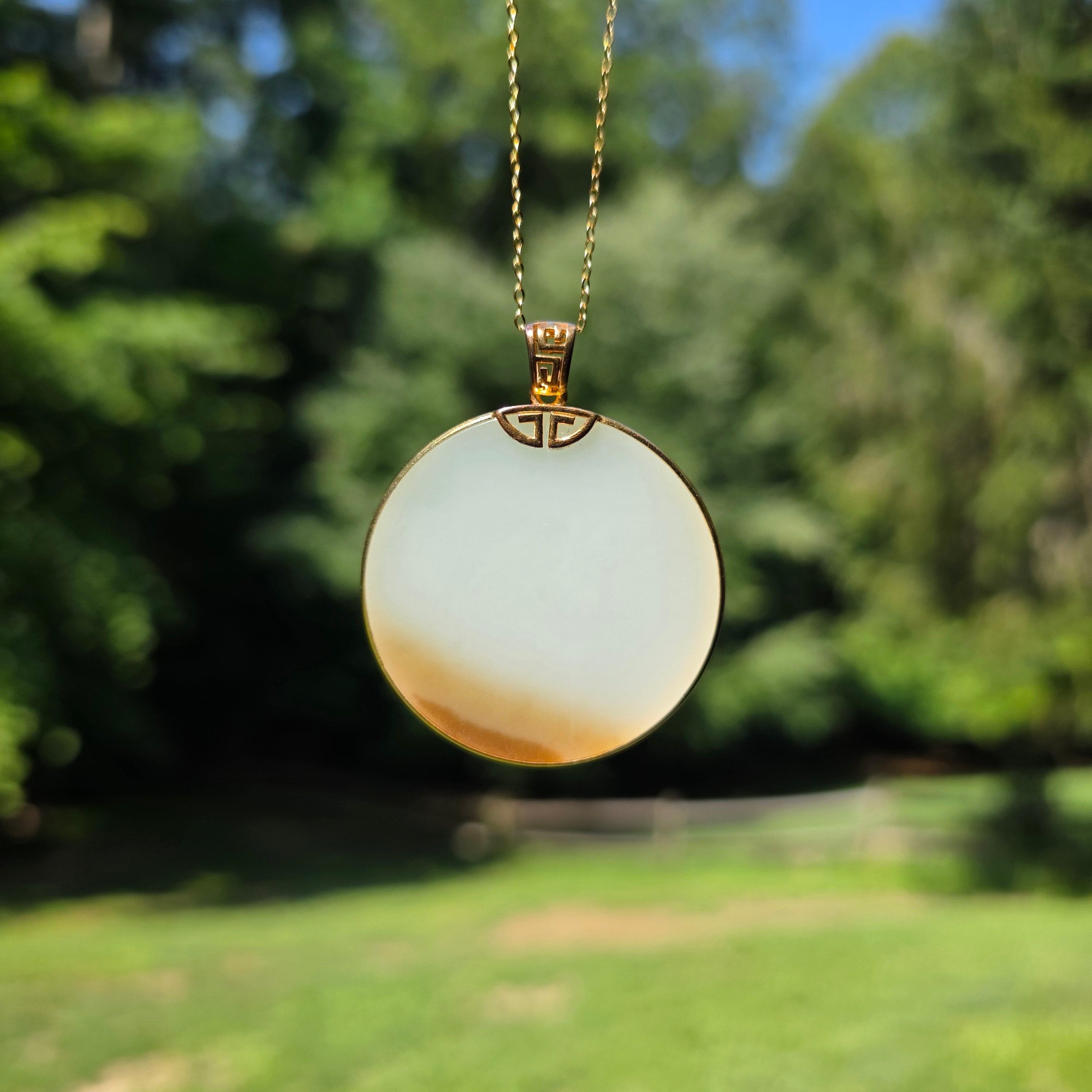 Round White Nephrite Jade Pendant with Russet Skin