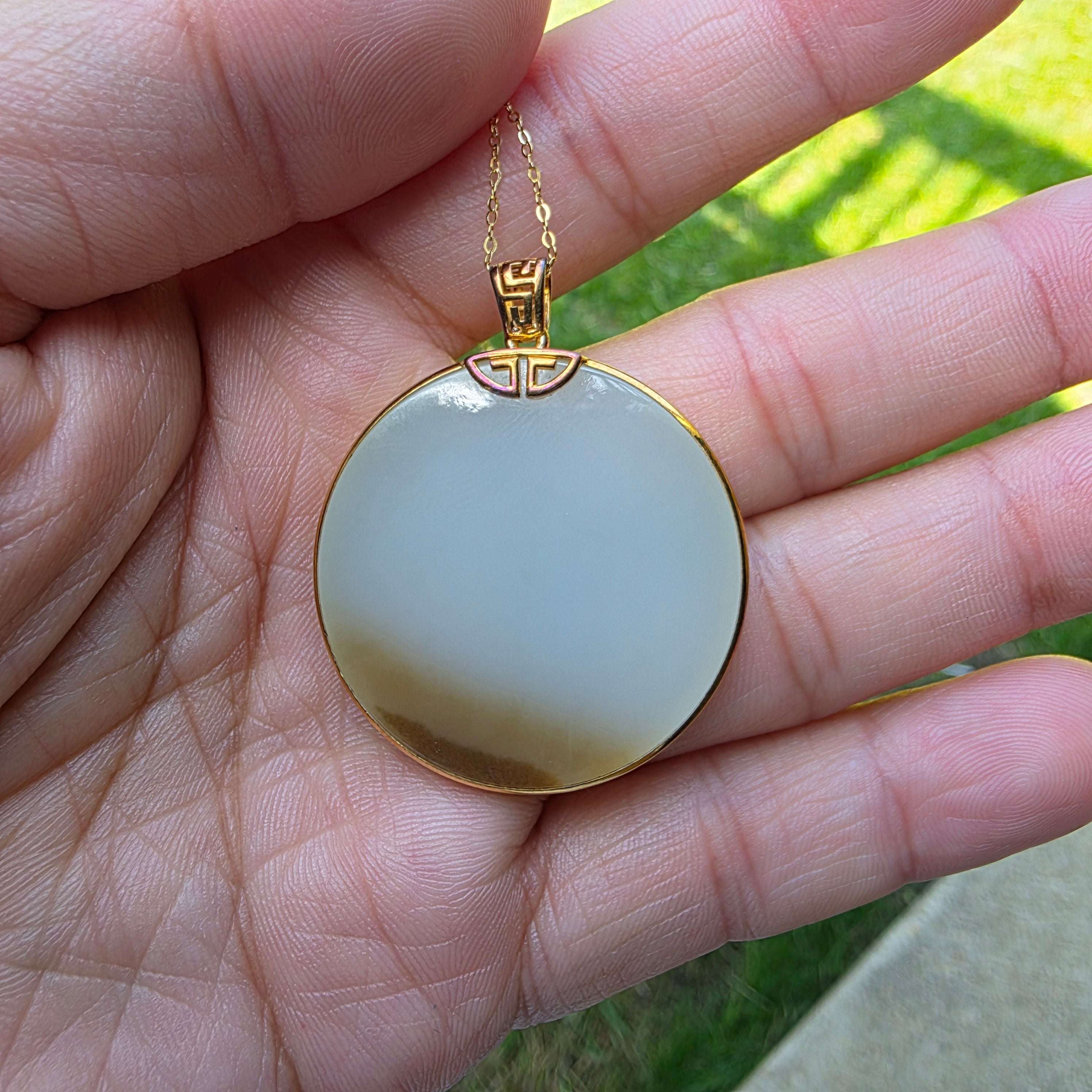 Round White Nephrite Jade Pendant with Russet Skin