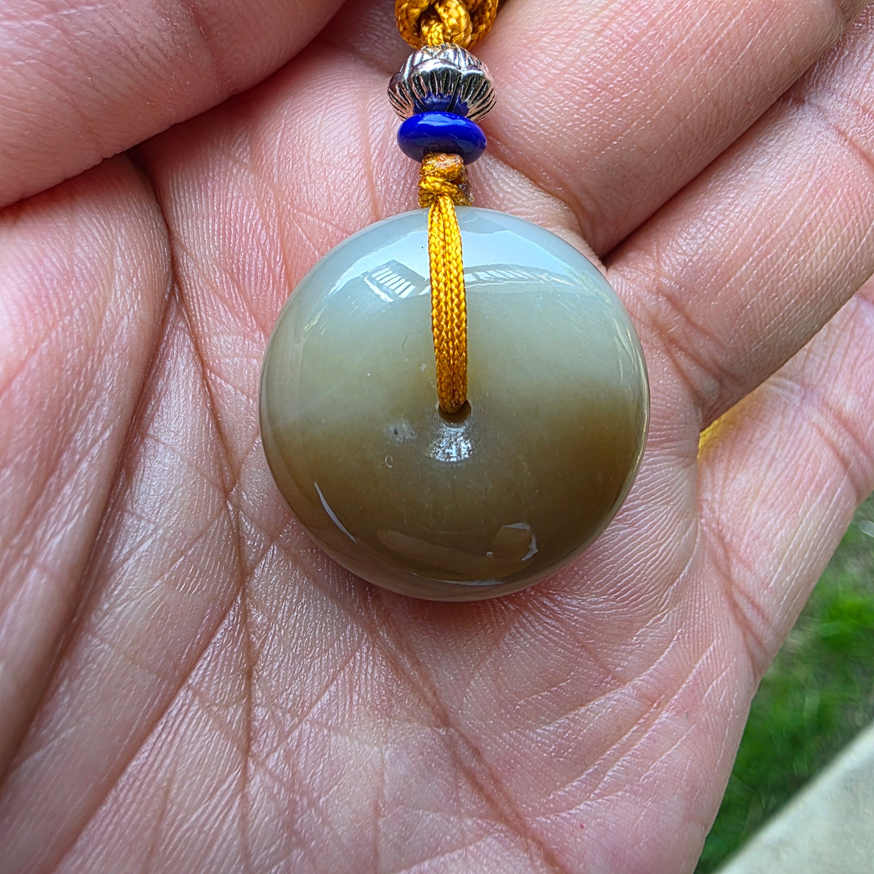 White and Caramel-Colored Nephrite Jade "Peace Buckle" Pendant