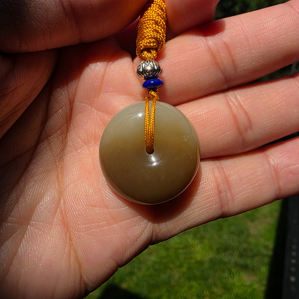 White and Caramel-Colored Nephrite Jade "Peace Buckle" Pendant