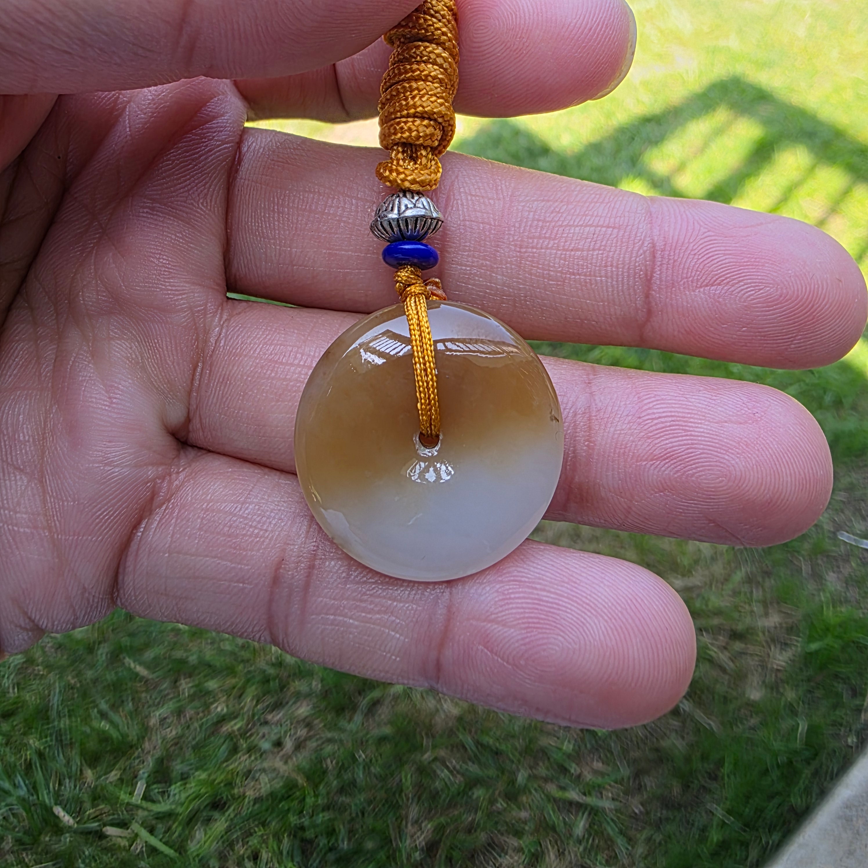 White and Caramel-Colored Nephrite Jade "Peace Buckle" Pendant