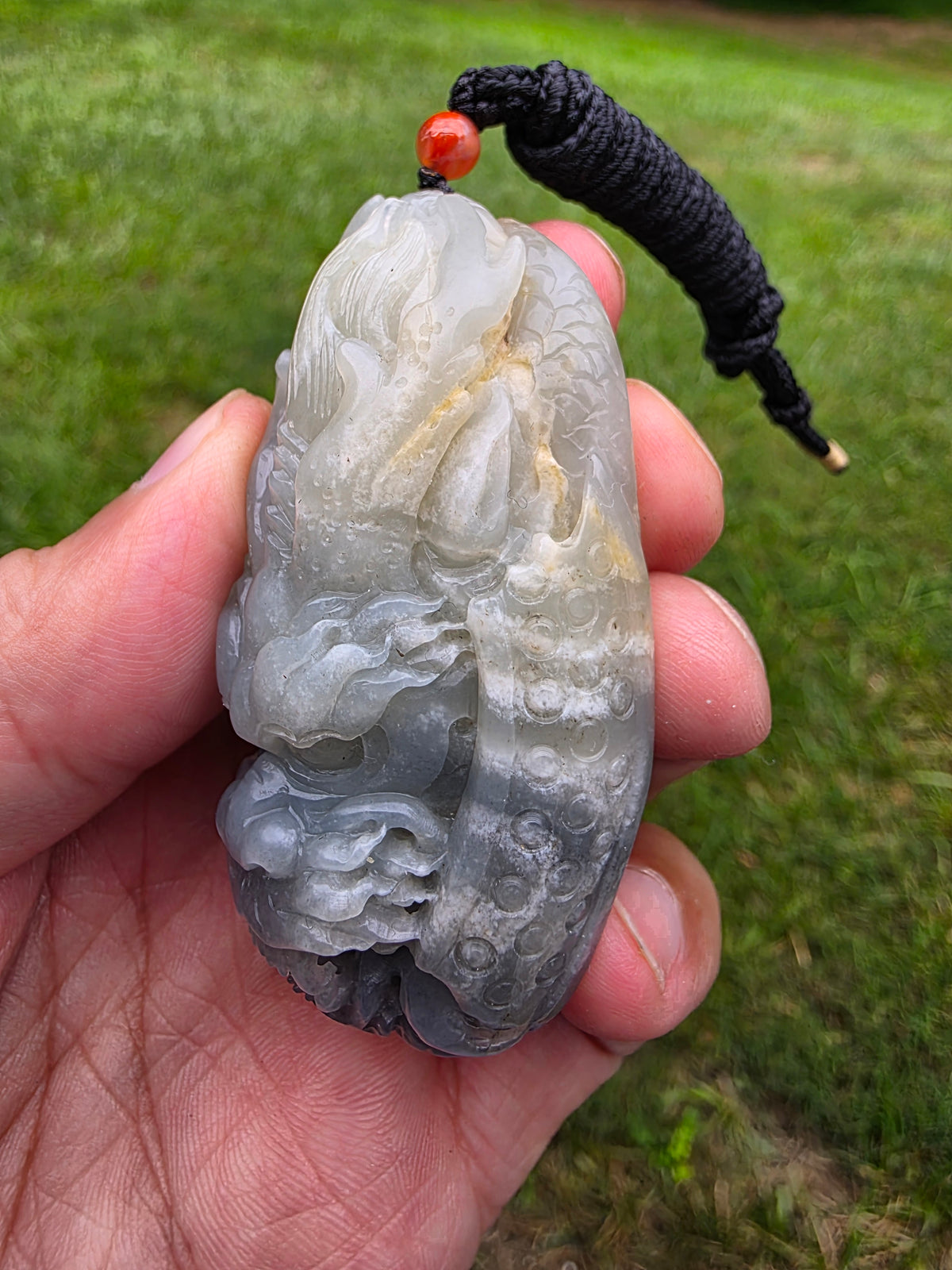 Nephrite river jade black and white dragon pendant