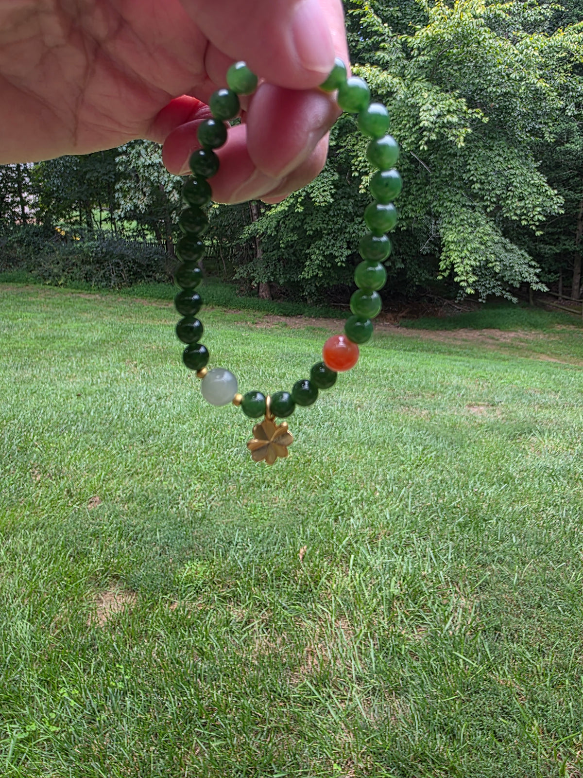Siberian jasper Bracelet (Adorned with one Nanhong Agate bead and one pale "Clear Water" jade bead)