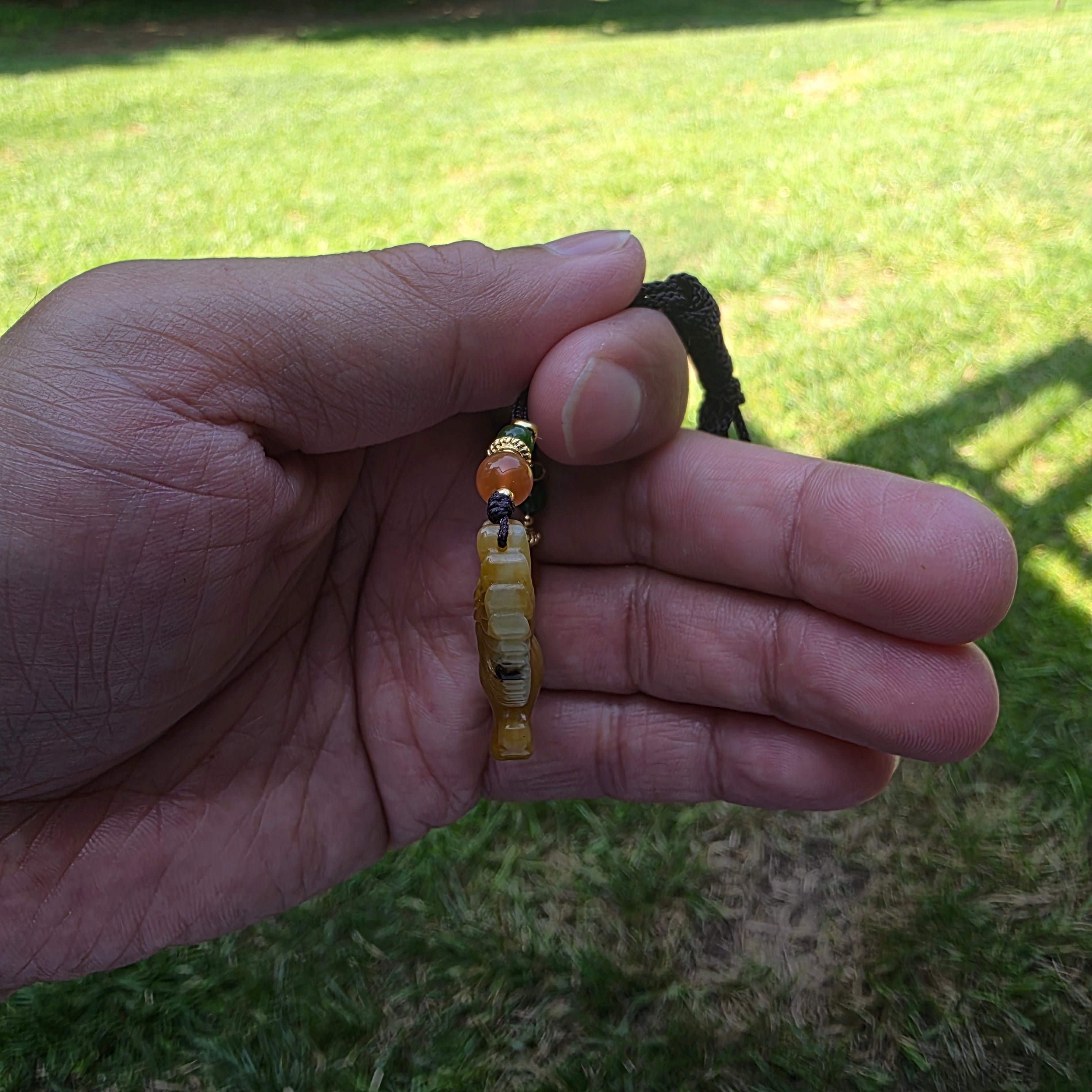 Nephrite jade pendant carved with a flying eagle