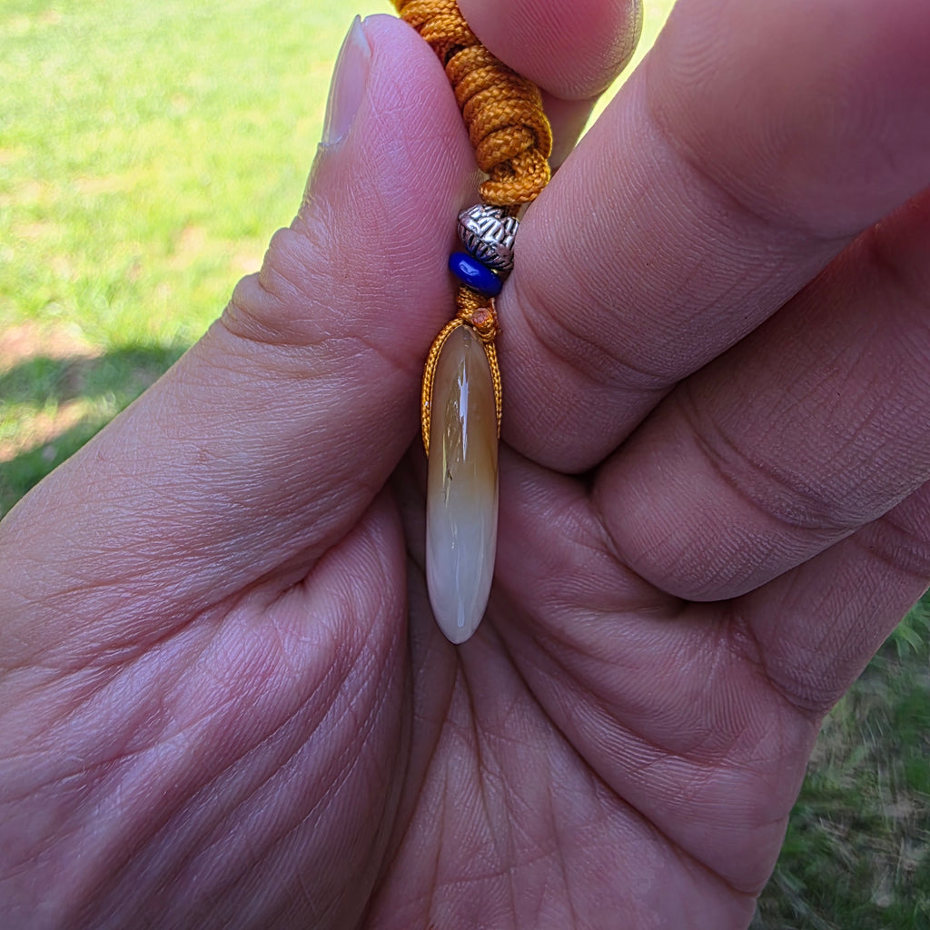 White and Caramel-Colored Nephrite Jade "Peace Buckle" Pendant