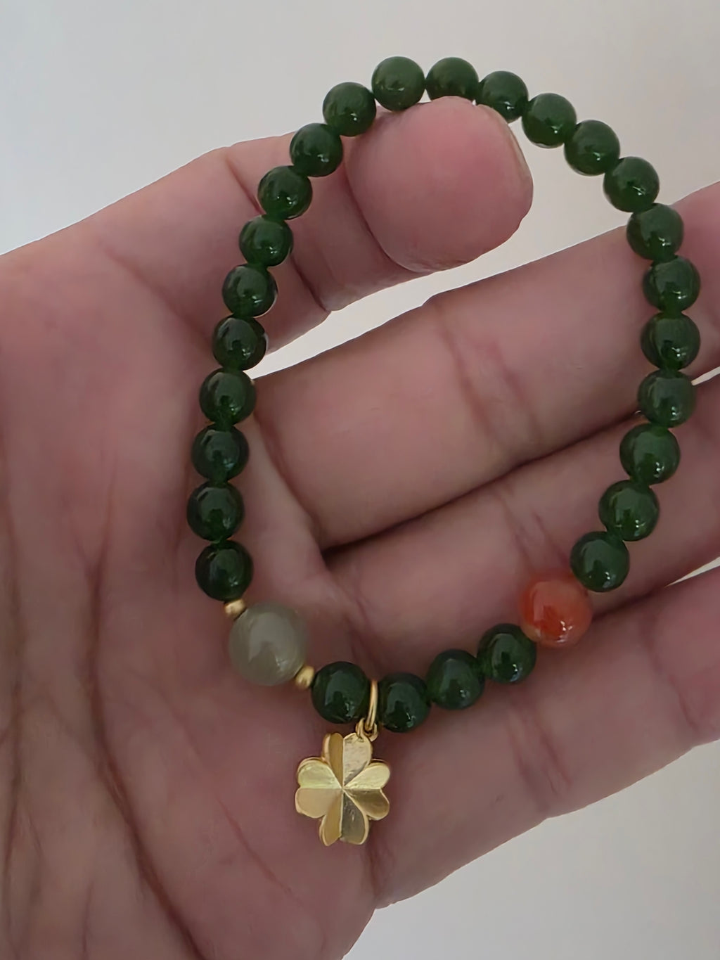Siberian jasper Bracelet (Adorned with one Nanhong Agate bead and one pale "Clear Water" jade bead)