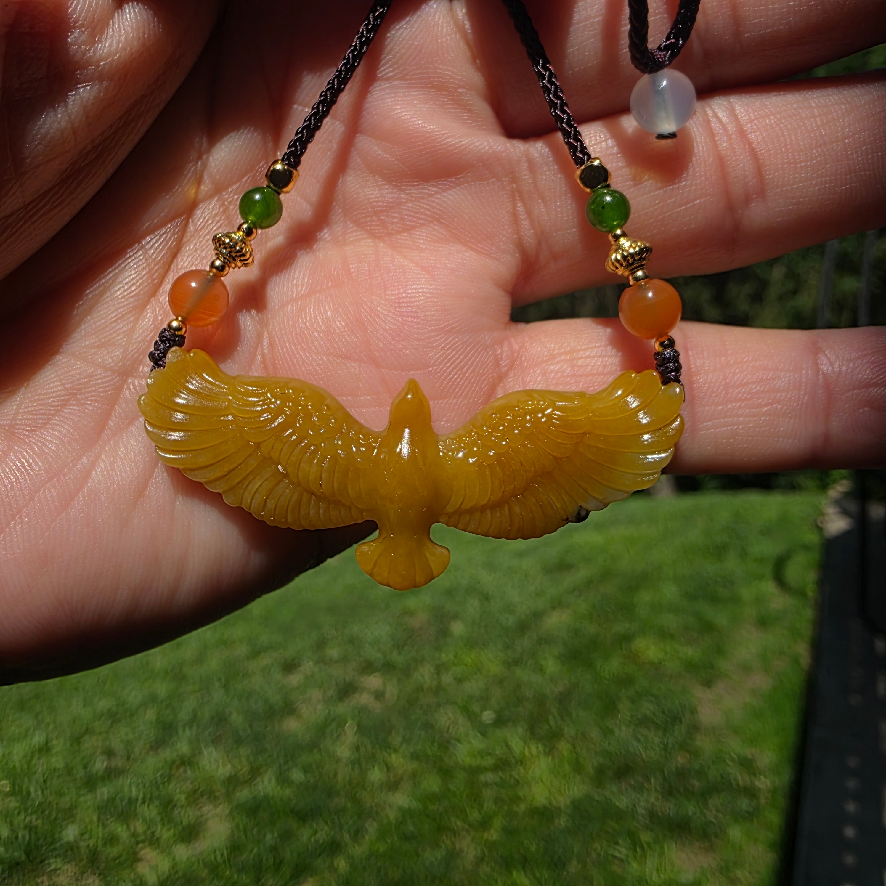 Nephrite jade pendant carved with a flying eagle